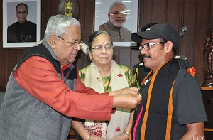 The Governor of Arunachal Pradesh Shri. P B  Acharya  and State First Lady Smti. Kavita Acharya with Mr Bhausaheb Bhawar, Cyclist at Raj Bhavan on 28th April2017.